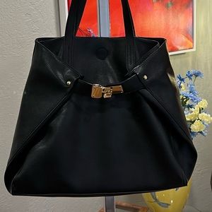 SOLD 
Black trapeze handbag